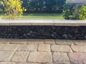 black stone ledge and paver sealing