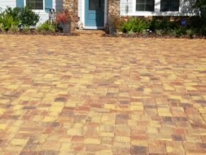 yellow and brown pavers that were recently sealed